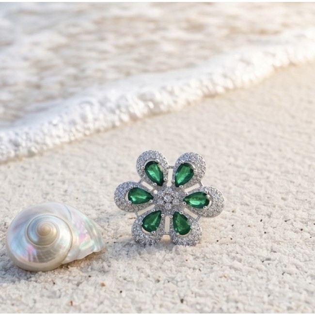 Giovanna - Authentic 10.9 carat Colombian Emerlad .925 Sterling Silver Silver dipped in Rhodium handcrafted Ring size 8 - Emerald flower ring close-up on beach with shell background.