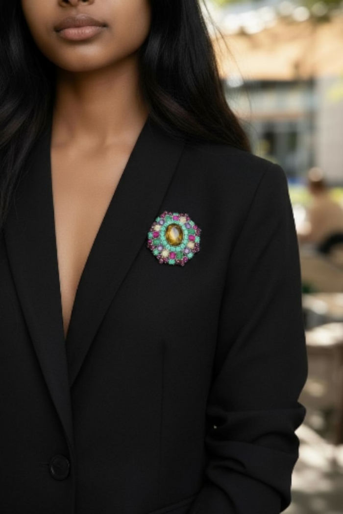 Luxury genuine 48.5 CARAT Champagne Topaz .925 Sterling Silver handmade Pendant Brooch - Brooch with champagne topaz on black jacket, partial upper body view.