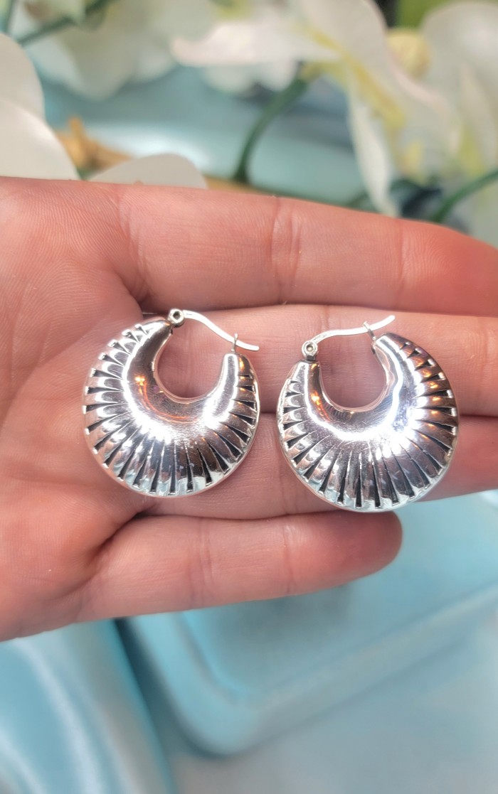 Highly Polished Fancy Modern design .925 Sterling Silver Italy made Earrings - Highly polished sterling silver earrings on hand, front view.