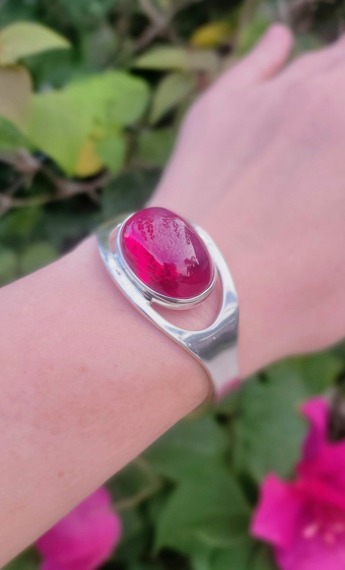 Very Rare - Bellezza Genuine 44.5 CARAT Star Ruby .925 Sterling Silver HUGE Bracelet / Cuff - Close-up of a star ruby bracelet worn on the wrist.