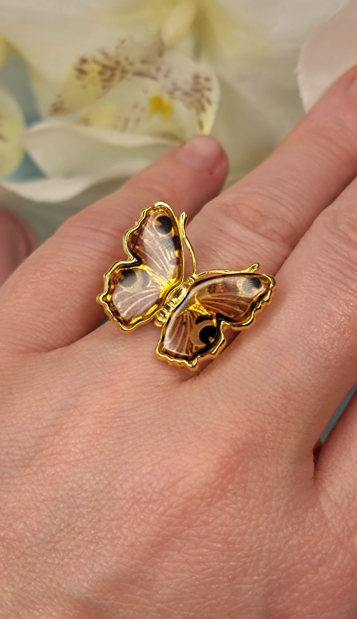 Butterfly Authentic Baltic Amber 14K Gold over.925 Sterling Silver handcrafted ring; s. 8 adjustable - Butterfly amber gold ring worn on hand, close-up detail.