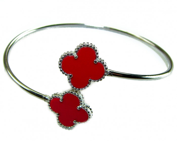 A Red four-leaf clover Coral .925 Sterling Silver handcrafted Bracelet - Red four-leaf clover bracelet, angled view, sterling silver details.