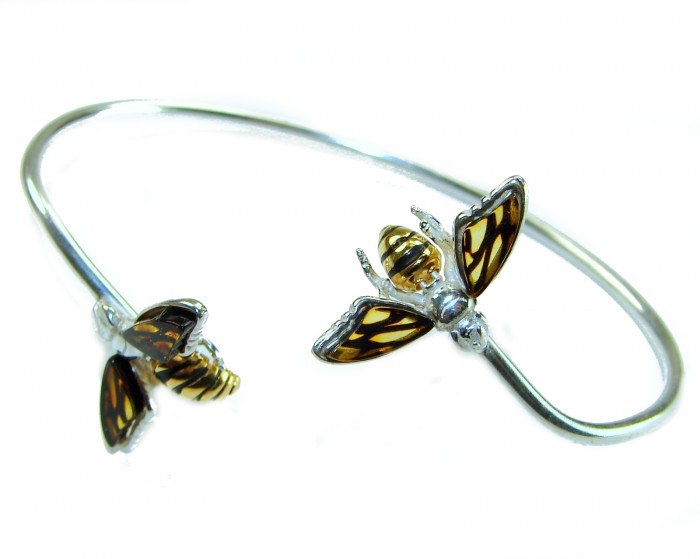 Golden Bees Genuine Baltic Amber .925 Sterling Silver handamde Bracelet - Silver bracelet with golden bee detail, top view.