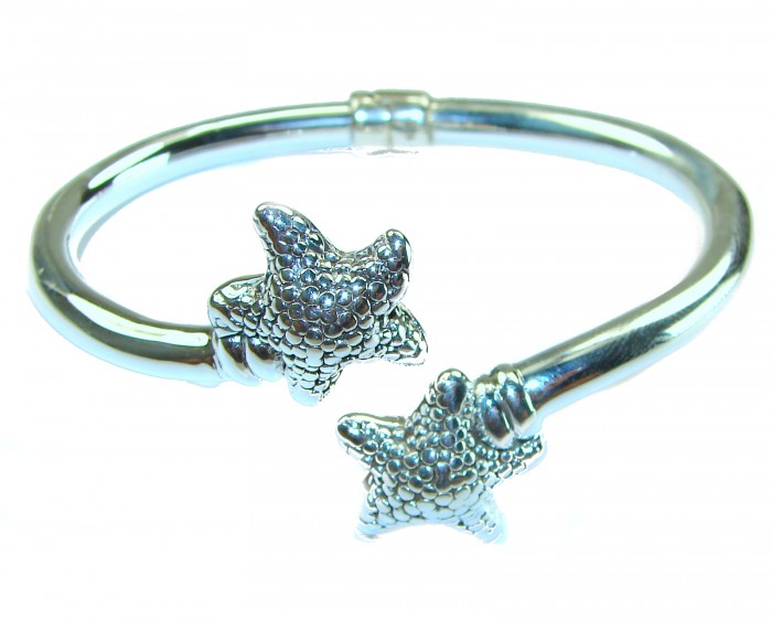 Seaside Italy made Starfish Bracelet in best quality .925 Sterling Silver - Close-up of silver starfish bracelet in focus.