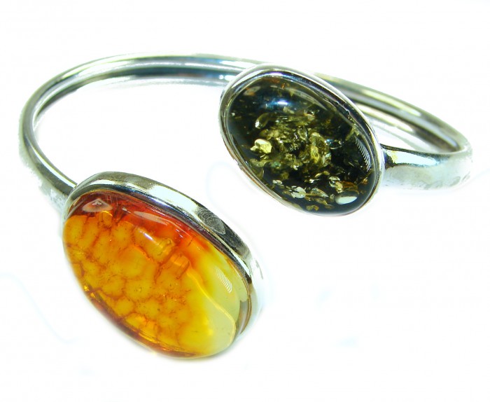 Vintage Design Genuine 29.5 carat faceted Baltic Amber .925 Sterling Silver handmade Bracelet - Close-up of vintage Baltic amber bracelet with two faceted stones.