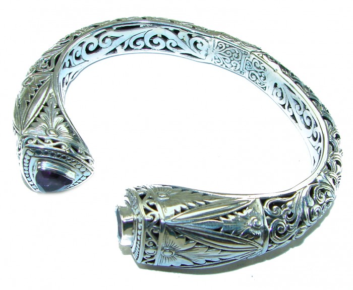 Infinity 49.5 grams authentic 8.9 carat Amethyst Floral Bracelet in .925 Sterling Silver handcrafted bracelet - Ornate silver bracelet with amethyst, detailed floral engraving, top view.