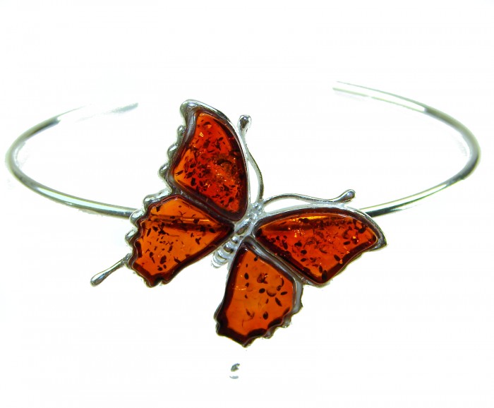 Golden Butterfly Genuine carved Baltic Amber .925 Sterling Silver dipped in 18K Gold handamde Bracelet - Butterfly bracelet with amber on silver band, top view.