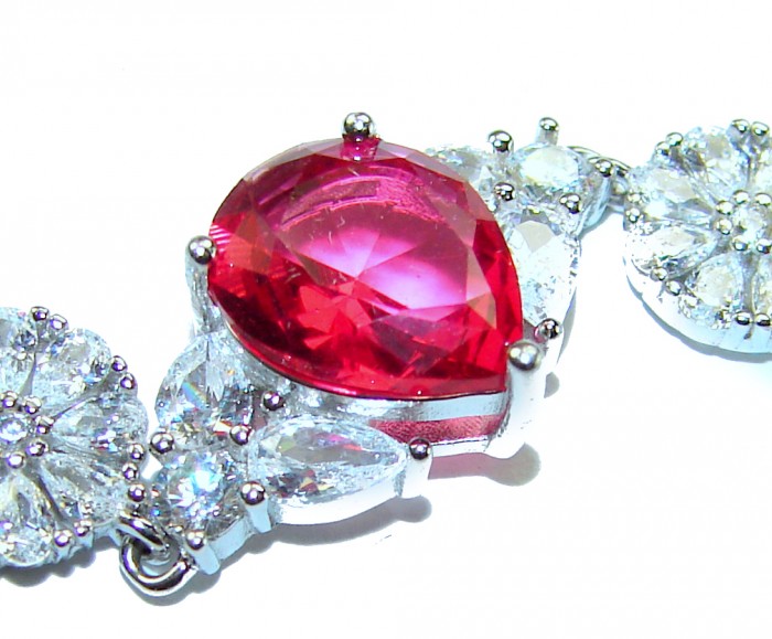 Giovanna - Magnificent Jewel 7.2 carat Ruby .925 Sterling Silver handcrafted incredible Statement Bracelet - Close-up of ruby and clear stones on sterling silver setting.