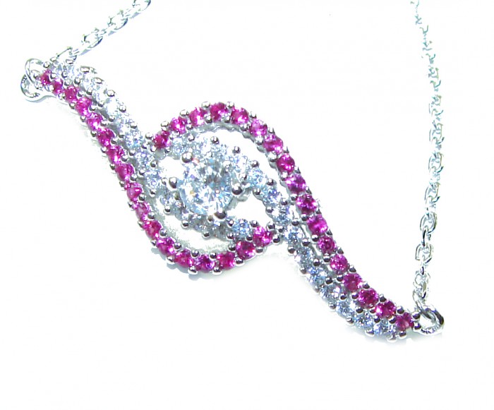 7.5 carat Ruby .925 Sterling Silver handmade Statement Bracelet - Ruby and silver bracelet, side view, showcasing stones and design details.