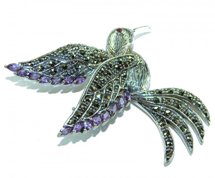 Incredible Flaying Bird Natural Amethyst Marcasite .925 Sterling Silver Brooch - Flaying bird brooch with amethyst and marcasite, angled view.
