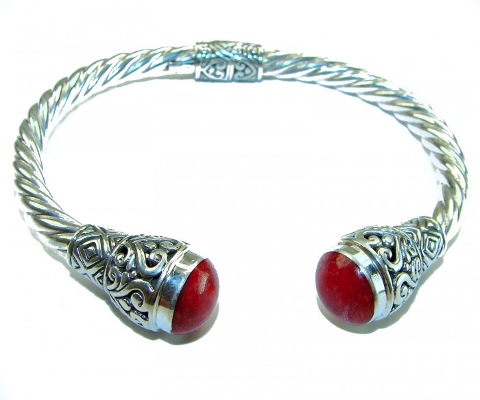 10.5 carat Fossilized Coral .925 Sterling Silver handcrafted Statement Bali made Bracelet - Silver bracelet with red coral ends, top view