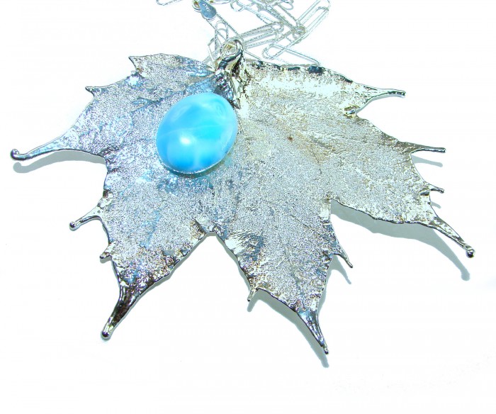 Beautiful Nature 8.2 carat Larimar Real Leaf dipped in Real .925 Sterling silver handcrafted necklace - Silver-dipped leaf pendant with blue Larimar stone, top view.