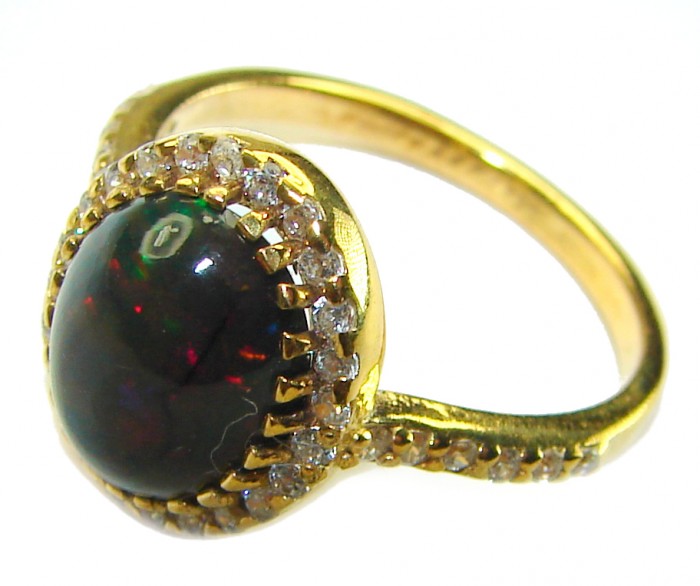 A COSMIC POWER Genuine 5.2 carat Black Opal 18K Gold over .925 Sterling Silver handmade Ring size 6 - Black opal ring in 18K gold, side view with stone close-up.