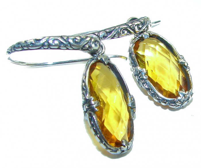 Bali Sun 8.9 CARAT authentic Citrine .925 Sterling Silver handmade Earrings - Citrine earrings in sterling silver, side view close-up.