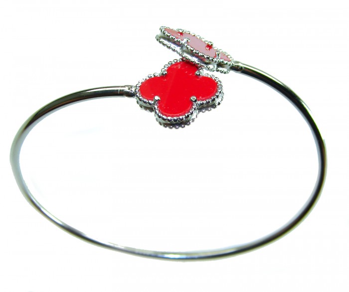A Red four-leaf clover Coral .925 Sterling Silver handcrafted Bracelet - Red four-leaf clover coral bracelet, silver, top view.