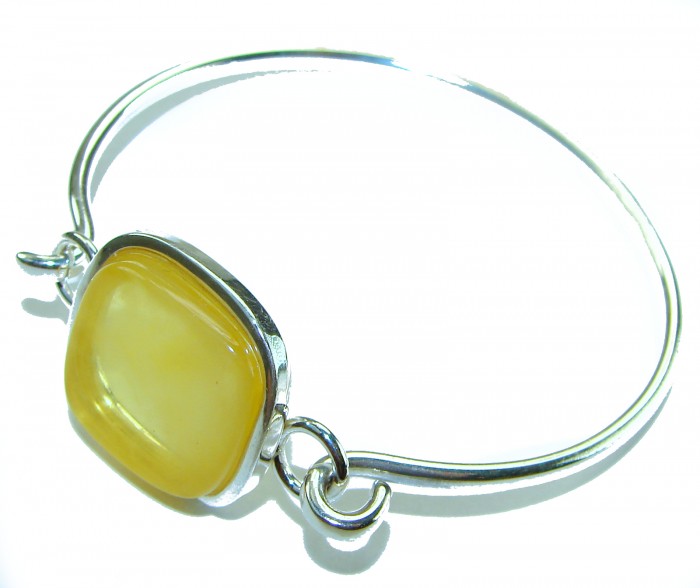 Genuine Butterscotch Polish Amber .925 Sterling Silver handmade Bracelet / Cuff - Sterling silver bracelet with butterscotch amber, angled view.