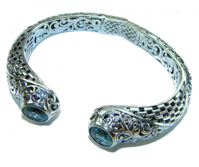 Large and Heavy Bali Legacy 45.5 grams authentic 10.9 carat Swiss Blue topaz Floral Bracelet in .925 Sterling Silver handcrafted - Intricate Bali Legacy bracelet with gemstones, top angle view.
