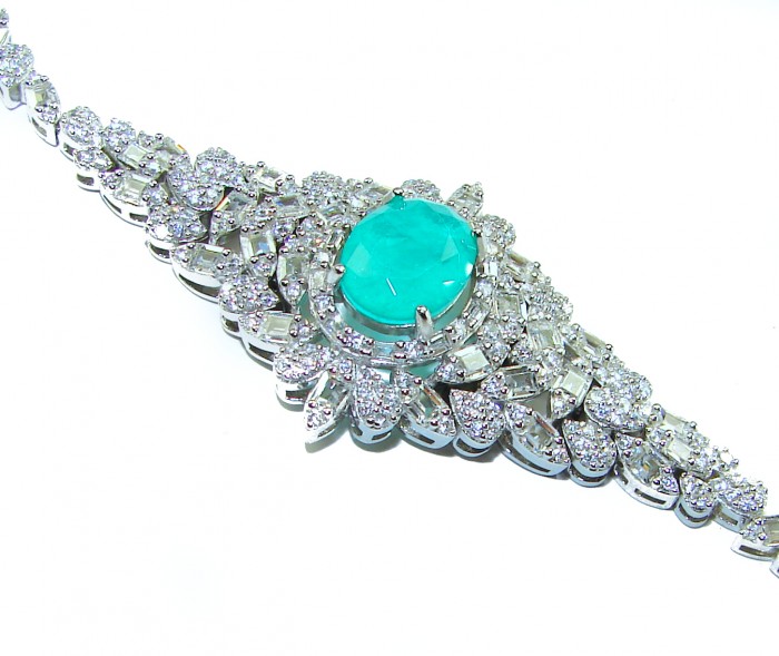 Gabriella 10.2 carat authentic Emerald rhodium over .925 Sterling Silver handcrafted Statement bracelet - Emerald stone close-up on Gabriella rhodium bracelet, top view.