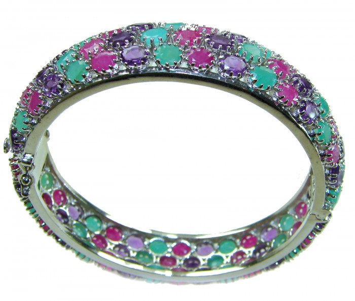 Anna Maria Authentic 61.2 carat Ruby Emerald Sapphire .925 Sterling Silver handmade bangle Bracelet - Colorful gemstone bangle, angled view showing rubies, emeralds, sapphires.