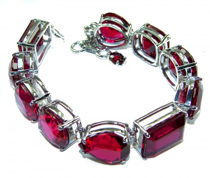 Bella Rosa - Magnificent 145.3 carat authentic Ruby .925 Sterling Silver handcrafted Bracelet - Ruby bracelet close-up with silver settings, top view.