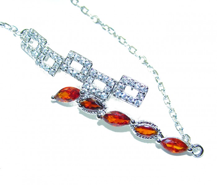Solid authentic 5.5 CARAT GARNET .925 Sterling Silver handcrafted bracelet - Garnet bracelet close-up with sterling silver detail.
