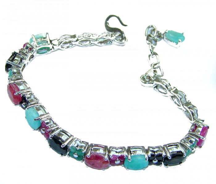 Tiffany 26.8 caratVCOLOMBIAN EMERALD Ruby Sapphire .925 Sterling Silver handcrafted Bracelet - Side view of gemstone bracelet with emerald, ruby, and sapphire stones