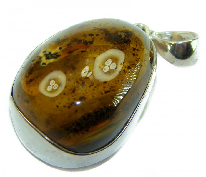 Prehistoric Authentic Baltic Amber .925 Sterling Silver beautifully handcrafted Pendant - Close-up of prehistoric Baltic amber pendant with sterling silver setting