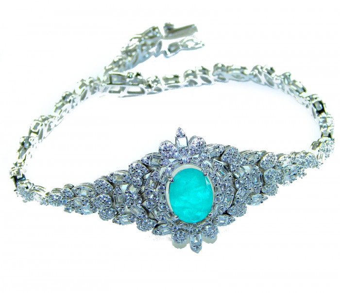 Gabriella 10.2 carat authentic Emerald rhodium over .925 Sterling Silver handcrafted Statement bracelet - Emerald bracelet front view with diamond accents and intricate design.