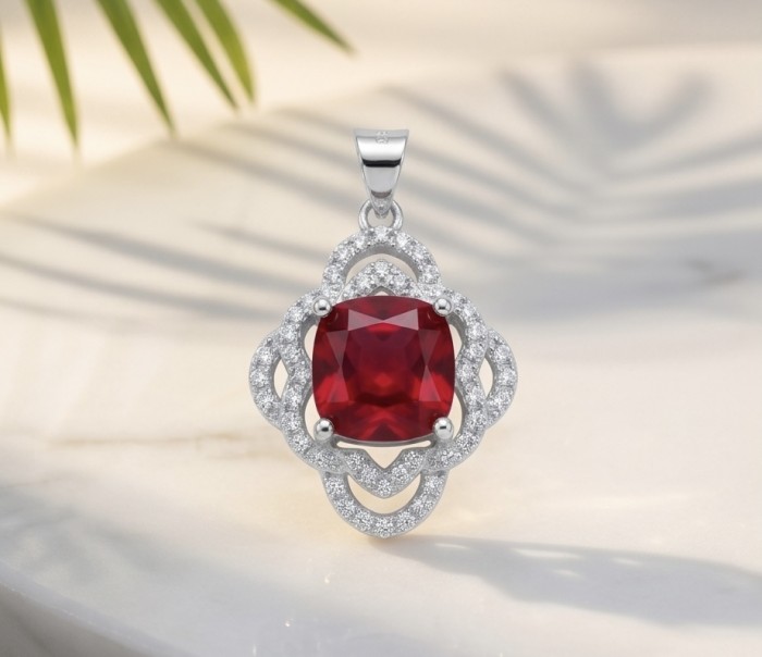 Authentic 6.5 CARAT Ruby .925 Sterling Silver Pendant - Ruby pendant on white background, front view showing details.