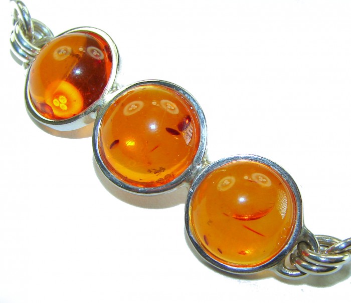 Excellent Baltic Amber .925 Sterling Silver entirely handcrafted Bracelet - Close-up of Baltic amber stones in sterling silver setting.