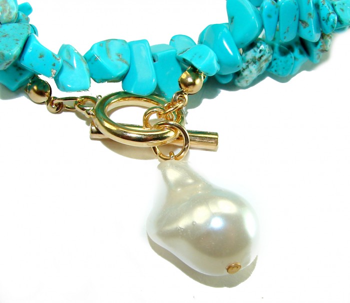 Luxurious natural Turquoise 14K Gold over .925 Sterling Silver handmade necklace - Turquoise necklace with gold clasp and pearl pendant close-up.