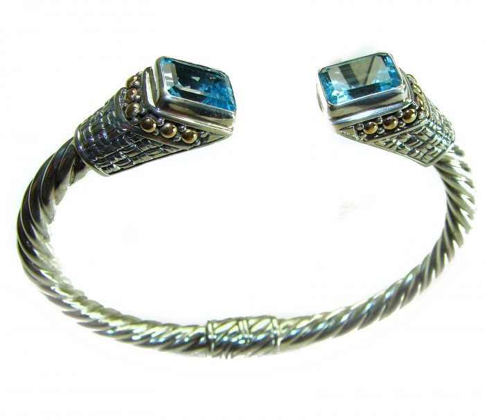 Bali Legacy authentic 8.9 carat Swiss Blue topaz Floral Bracelet in .925 Sterling Silver handcrafted - Silver cuff bracelet with blue topaz, angled top view.