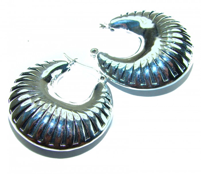 Highly Polished Fancy Modern design .925 Sterling Silver Italy made Earrings - Highly polished .925 sterling silver earrings, top view.
