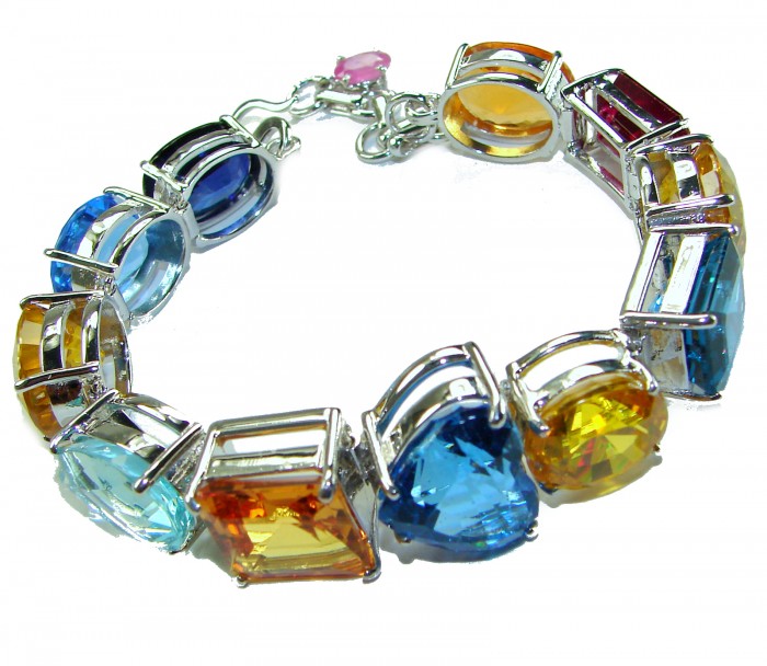 Tutti Frutti 65.5 CARAT MUTIGEM .925 Sterling Silver brilliantly handcrafted Bracelet - Colorful multi-gem bracelet, side view showcasing various stones.
