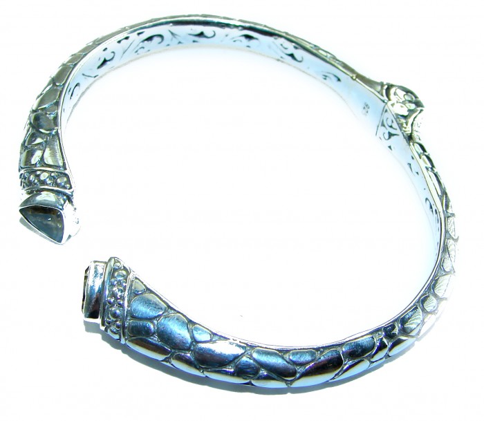 6.5 carat Amethyst .925 Sterling Silver handcrafted Statement Bali made Bracelet - Sterling silver bracelet with amethyst, side view, engraved details.