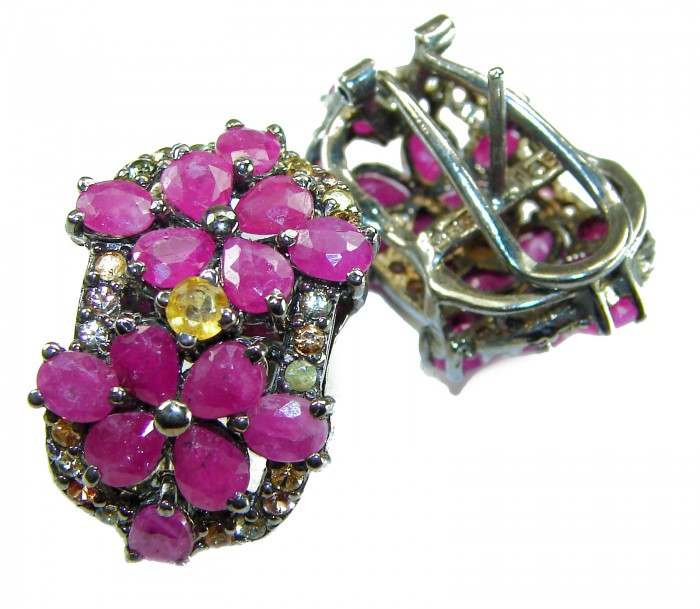 Bella Rosa Genuine 22.8 carat Ruby .925 Sterling Silver dipped in black rhodium Statement brilliantly handcrafted earrings - Close-up of Bella Rosa 22.8 carat ruby earrings on sterling silver.