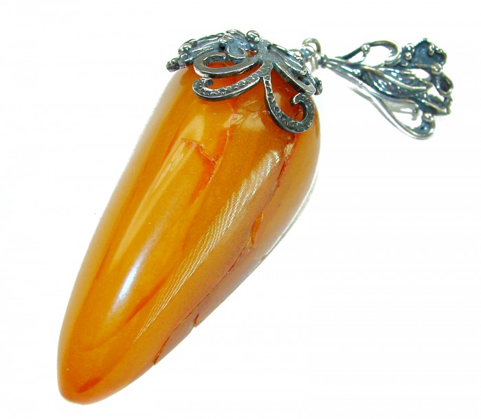 Large 3 3/4 inches Prehistoric Authentic Baltic Amber .925 Sterling Silver beautifully handcrafted Pendant - Close-up of large Baltic amber pendant with intricate metal detailing