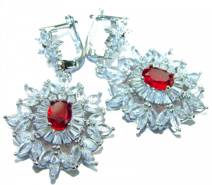 Magnificent Jewel 8.5 carat Ruby .925 Sterling Silver handcrafted incredible earrings - Close-up of ruby and sterling silver earrings, front view.