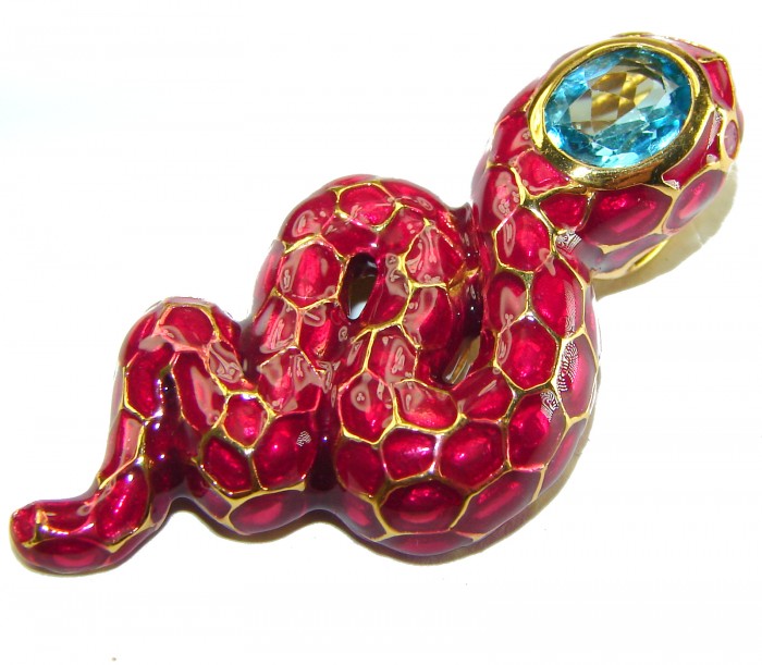 INCREDIBLE Natural Ruby Enamel Snake 14K Gold over .925 Sterling Silver Pendant - Snake-shaped ruby enamel ring with blue stone, top view.