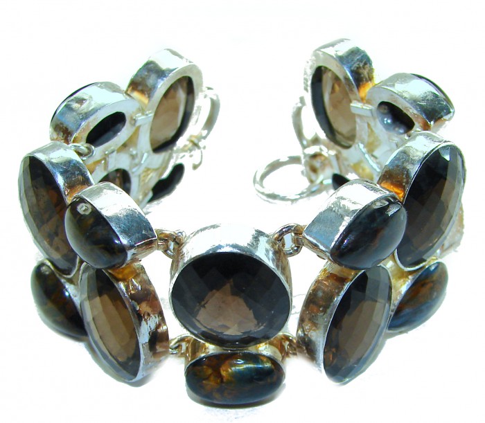 Faith Washed Fear Away 70.2 grams carat Smoky Topaz .925 Sterling Silver handcrafted bracelet - Smoky Topaz bracelet close-up showcasing faceted stones.