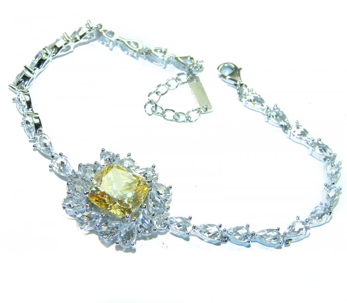 Luxurious 22.5 carat pricess cut Authentic Yellow Sapphire .925 Sterling Silver handcrafted Statement Bracelet - Luxurious bracelet with yellow sapphire and diamonds, top view.