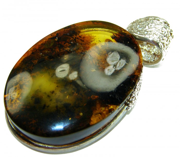 Prehistoric cognac Authentic Baltic Amber .925 Sterling Silver beautifully handcrafted Pendant - Close-up of prehistoric cognac Baltic amber pendant in sterling silver