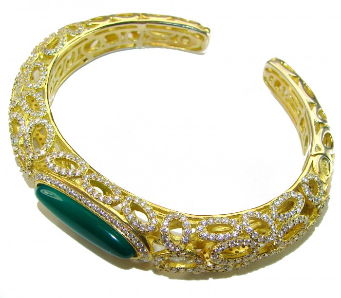 Luxurious Genuine 11.5 carat Jade 18K Gold over .925 Sterling Silver handmade Bracelet - Gold bangle with jade stone, side view showing detailed design.