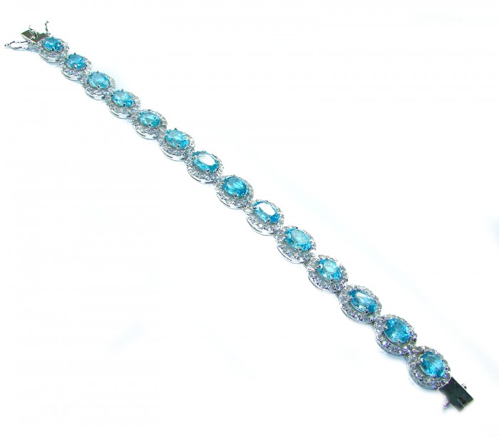 Spectacular 48.5 carat authentic Swiss Blue Topaz .925 Sterling Silver handmade Bracelet - Top view of Swiss Blue Topaz bracelet with sterling silver settings.