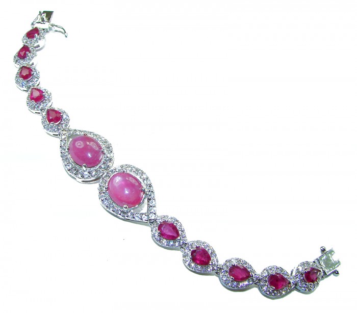 Dolce Vita - Precious Natural 52.5 carat Ruby black rhodium over .925 Sterling Silver handcrafted bracelet - Ruby bracelet with gemstones inlaid in a curved design, top view.