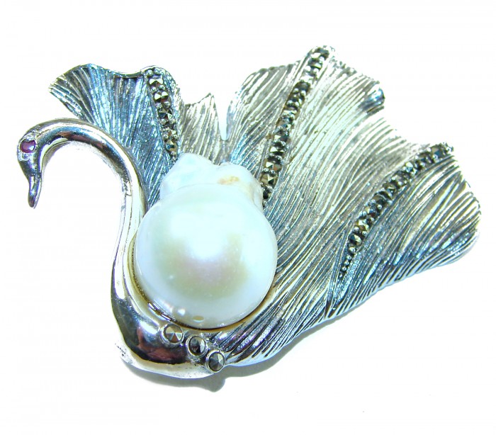 Perfect Swan Mother of Pearl Ruby .925 Sterling Silver handmade Pendant Brooch - Swan brooch with pearl and ruby detail, angled view.