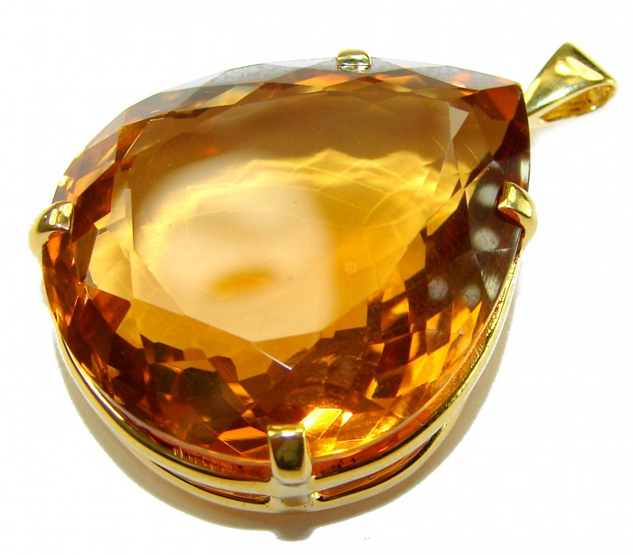 Luxury genuine 53.5 CARAT pear cut Champagne Topaz .925 Sterling Silver dipped in 18K Gold handmade Pendant - Close-up of a luxury 53.5 carat pear cut champagne topaz pendant