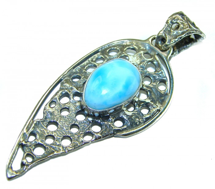 The best quality Natural Larimar from Dominican Republic .925 Sterling Silver handcrafted pendant - Side view of silver pendant with blue Larimar stone.