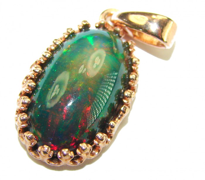 Black Galaxy 14.5 ctw Authentic Black Opal 18K Gold over .925 Sterling Silver handmade Pendant - Black opal pendant with gold border, stone close-up view