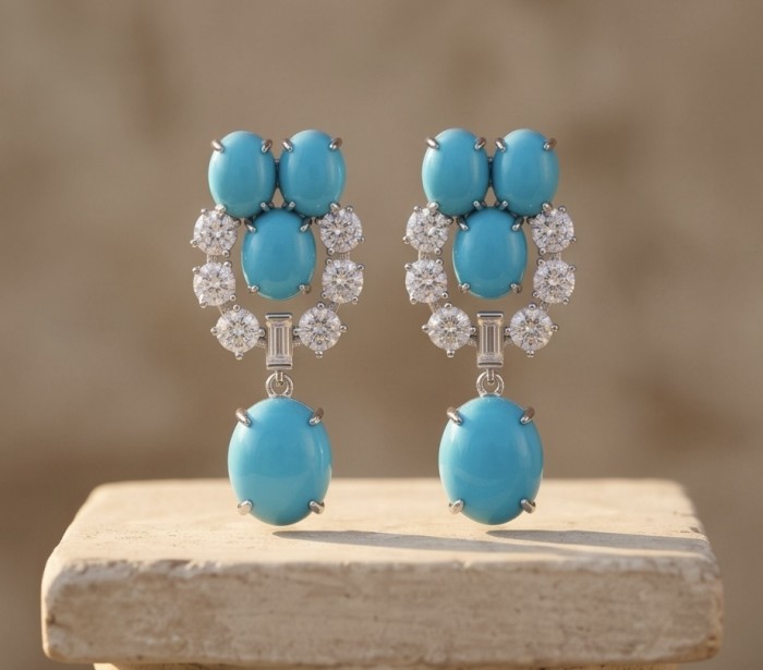 Great quality authentic Sleeping Beauty Turquoise rhodium over .925 Sterling Silver handcrafted Earrings - Front view of Sleeping Beauty Turquoise earrings with diamond accents.